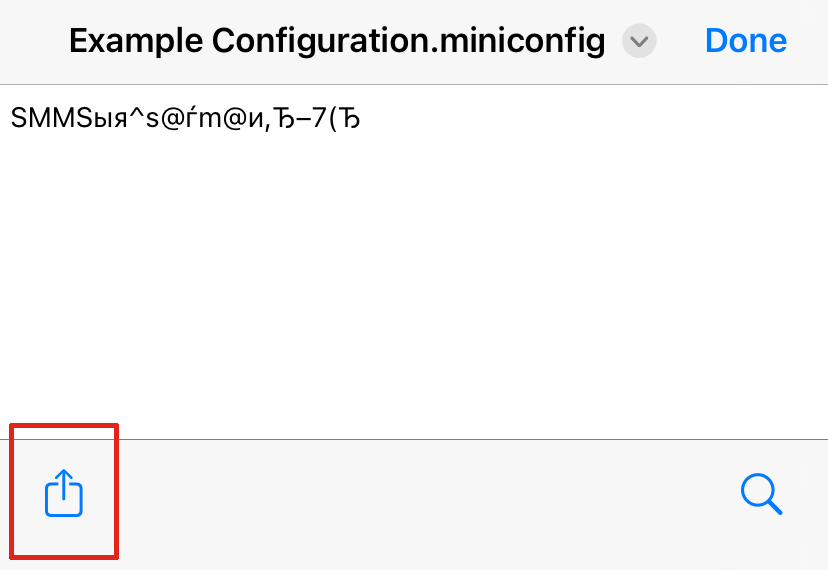 iOS 邮件中的附件弹出窗口将 .miniconfig 文件的名称显示为标题。文件正文是一串以 SMM 开头的无意义字符。共享按钮位于左下角。
